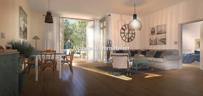 Cet appartement à vendre à Arcachon bénéficie d'une terrasse, d'un cellier et de 2 places de parking
